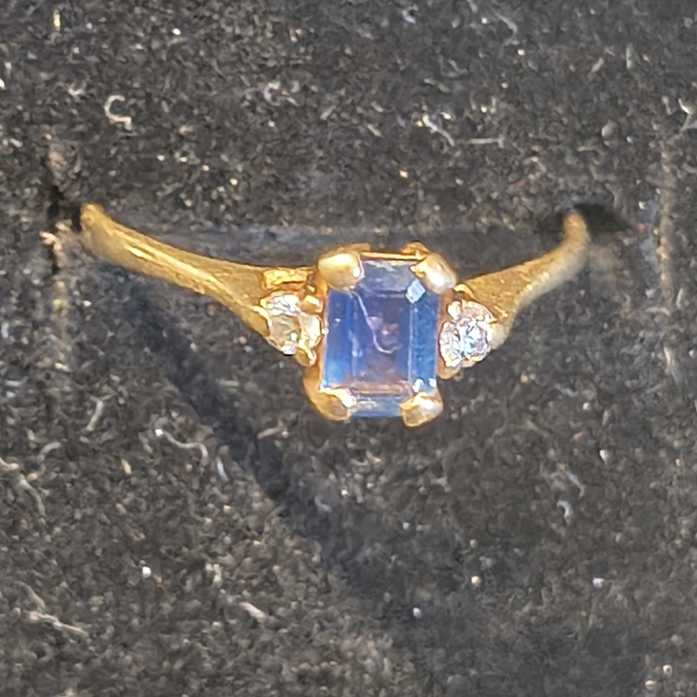 Gold Ring with Blue Gemstone and Accent Diamonds